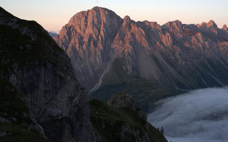 Mountain view from Rifugio Calgi at dusk with fog below